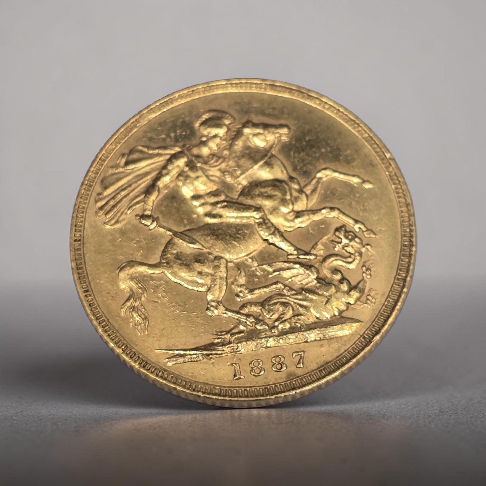 1887 Reeves and Sons full sovereign coin, 8g gold coin with detailed historical design and official markings.