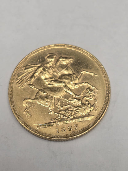 1887 Reeves and Sons full sovereign coin, 8g gold coin with detailed historic design and denomination visible.