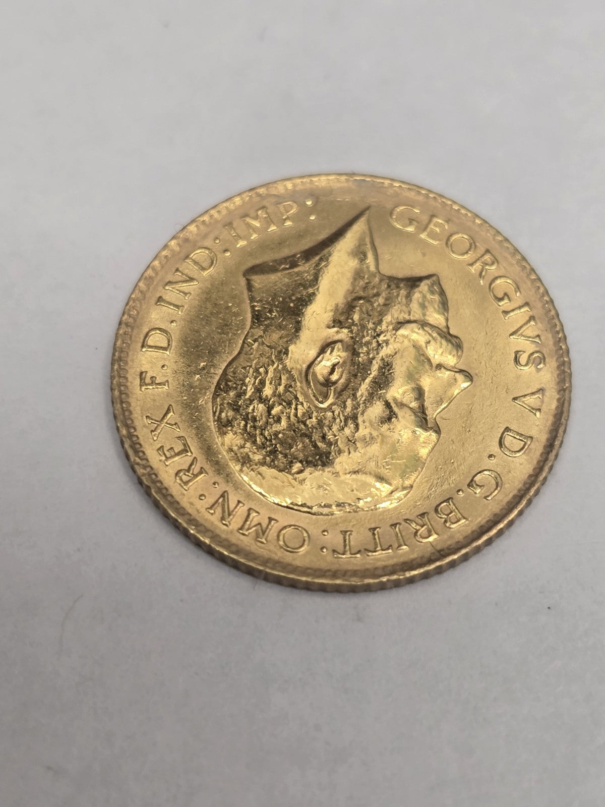 1914 Half Sovereign coin by Reeves and Sons showing detailed obverse and reverse images with a weight of 4g.