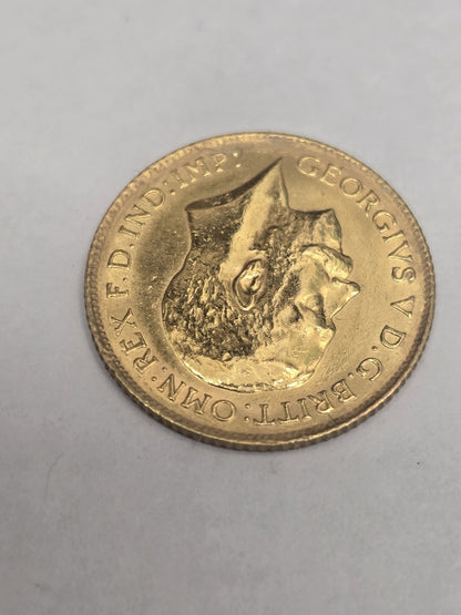 1914 Half Sovereign coin by Reeves and Sons showing detailed obverse and reverse images with a weight of 4g.