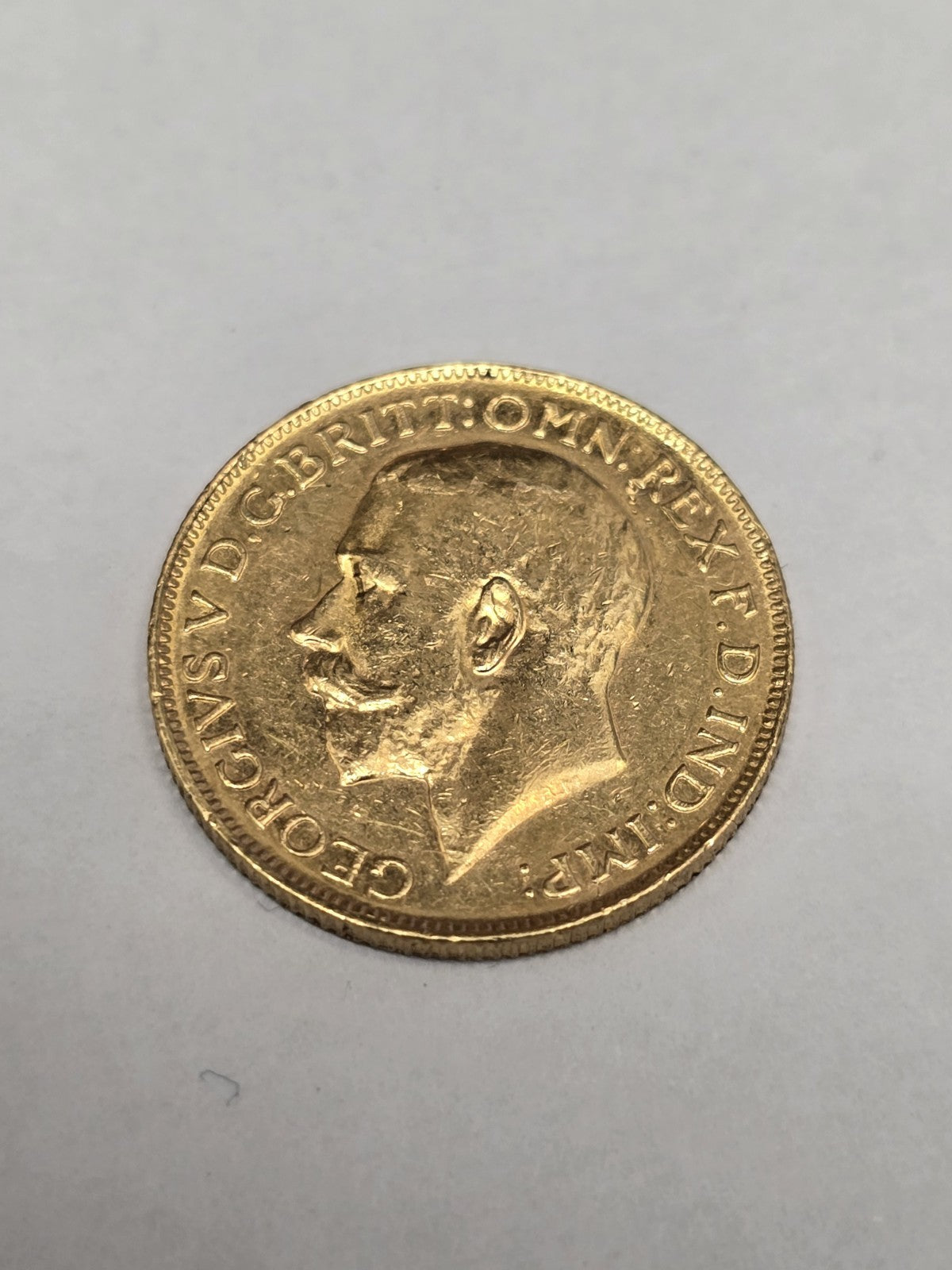 1920 full sovereign coin by Reeves and Sons, 8g gold coin with detailed sovereign design, vintage collectible currency.
