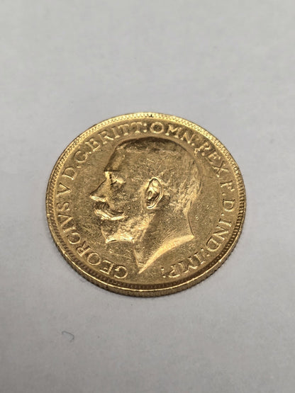 1920 full sovereign coin by Reeves and Sons, 8g gold coin with detailed sovereign design, vintage collectible currency.