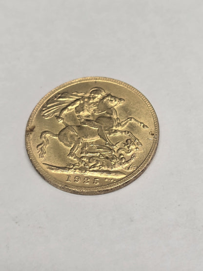 1925 Reeves and Sons full sovereign coin displaying detailed portrait and denomination, weighing 8 grams.