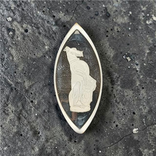 Reeves and Sons Queen's Beasts silver ingot with detailed engravings and official branding, showcasing fine craftsmanship.