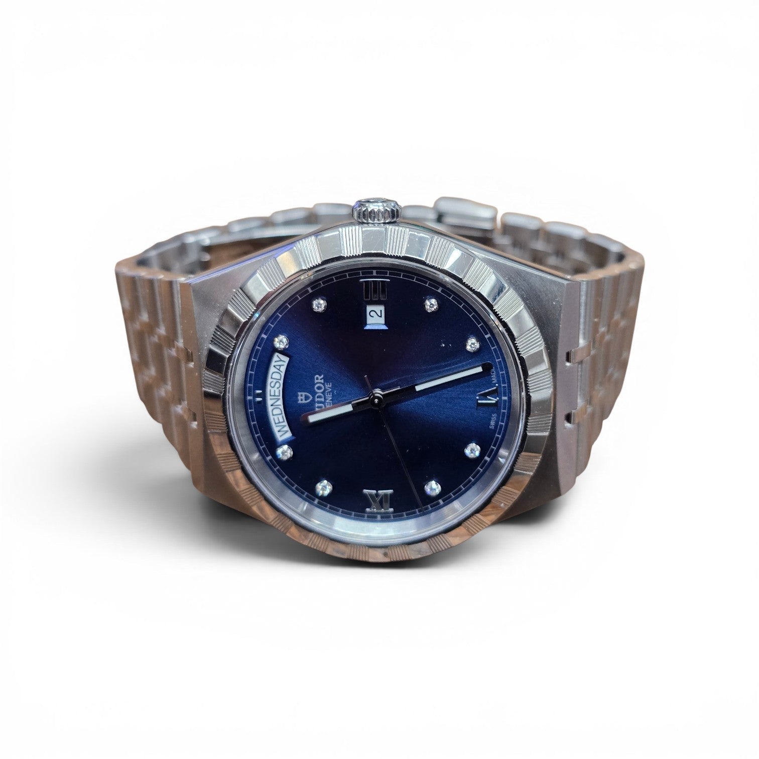 Reeves and Sons Tutor Royal Day Date Diamond Watch model 28600, silver dial with gold accents, luxury wristwatch.
