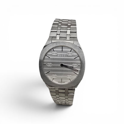 Reeves and Sons ladies Gucci watch box with accompanying paper, elegant packaging for a luxury wristwatch.