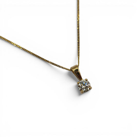 9ct yellow gold diamond pendant with chain, featuring a 0.25 carat diamond, from Reeves and Sons.