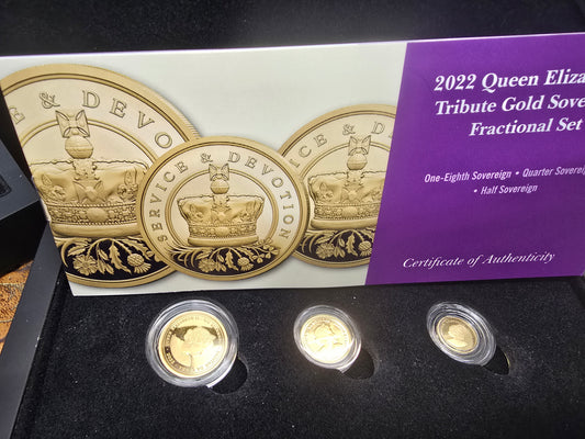 Silver coin set featuring Queen Elizabeth from Reeves and Sons, includes half, quarter, and eighth sovereign coins.