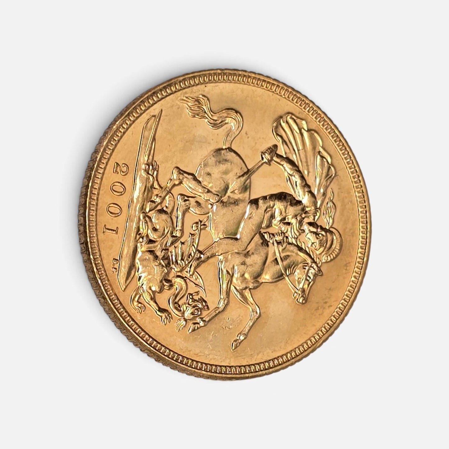 2001 Reeves and Sons full sovereign coin showing detailed design and inscriptions on a reflective surface.