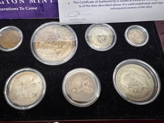 Reeves and Sons Kensington Mint 1935 Silver Jubilee set with silver coin, boxed, and certificate in detailed display.