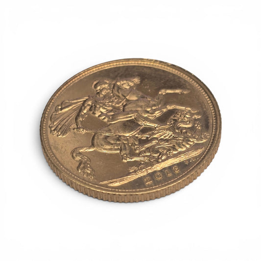 2012 Reeves and Sons full sovereign coin with detailed engravings and classic design on a neutral background.
