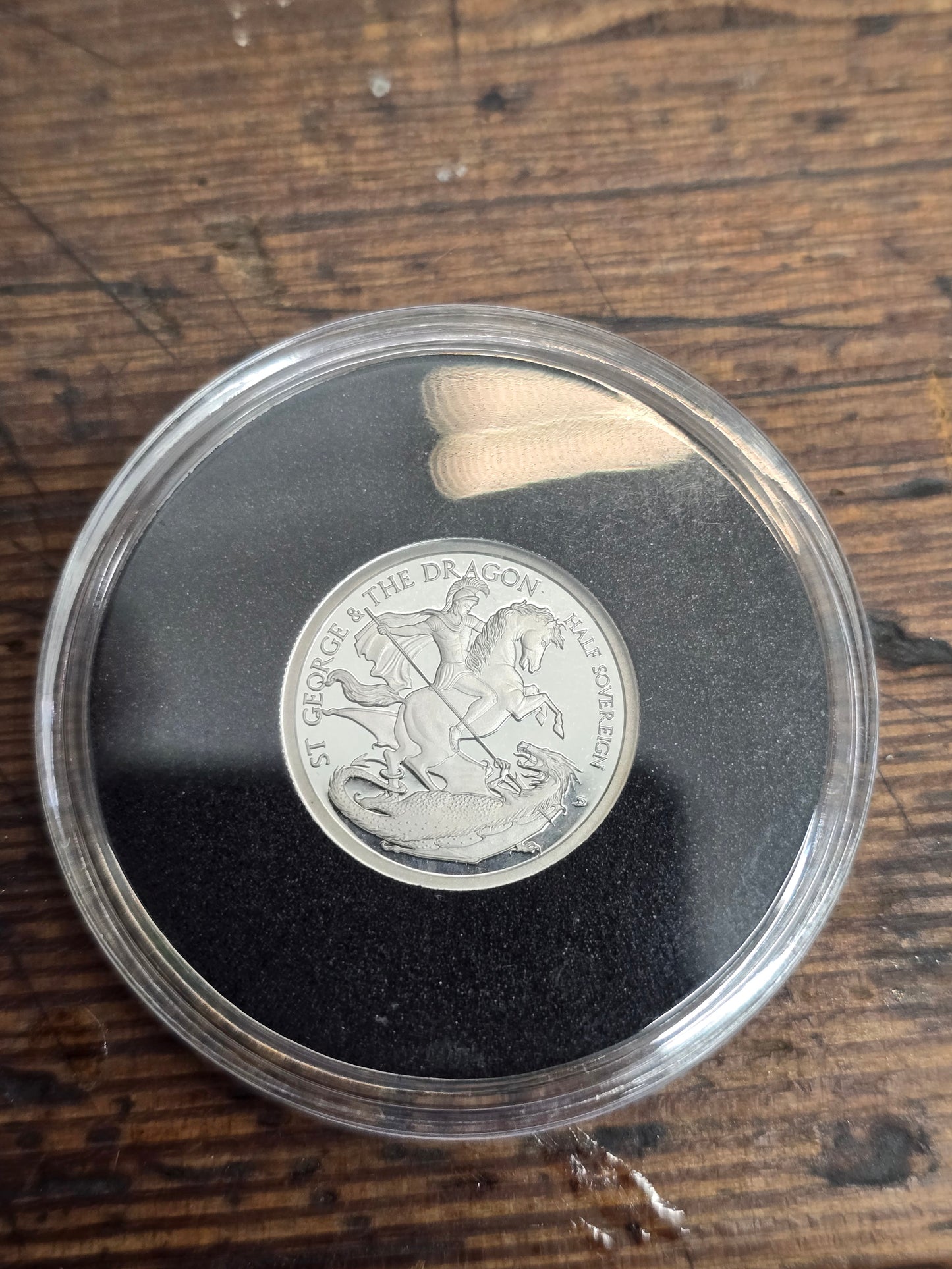 2024 Reeves and Sons St. George & Dragon platinum proof half sovereign silver coin with certificate, featuring detailed coin design.