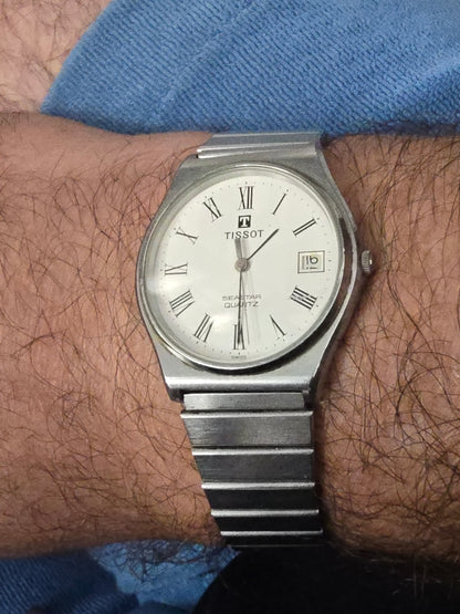 Vintage Tissot Seastar Quartz Stainless Steel White Dial Roman Numeral Date Watch