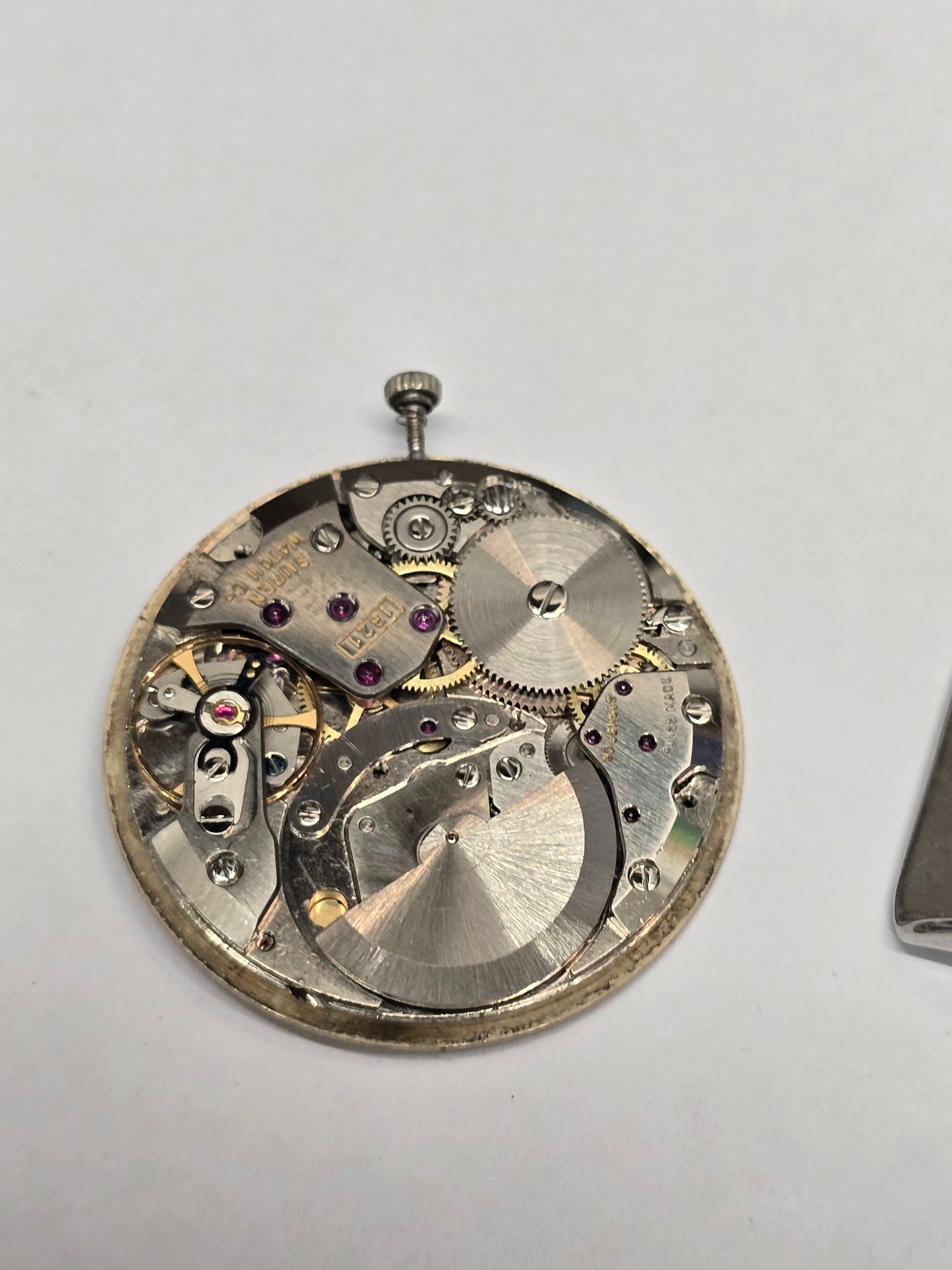 Vintage Reeves and Sons 9ct yellow gold men's Automatic Buren Intra-Matic Swiss watch with a classic round dial and gold bracelet.