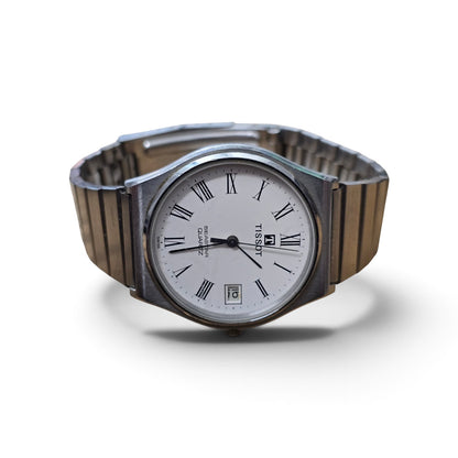 Vintage Tissot Seastar Quartz Stainless Steel White Dial Roman Numeral Date Watch