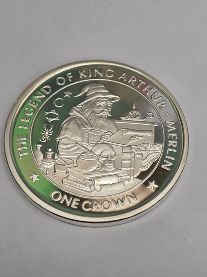 Silver King Arthur crown coin by Reeves and Sons, featuring detailed legend and classic design, showcasing intricate craftsmanship.