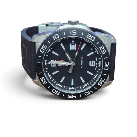 Reeves and Sons Navy SEAL style dive watch with black dial, rotating bezel, rubber strap, water-resistant to 200M.