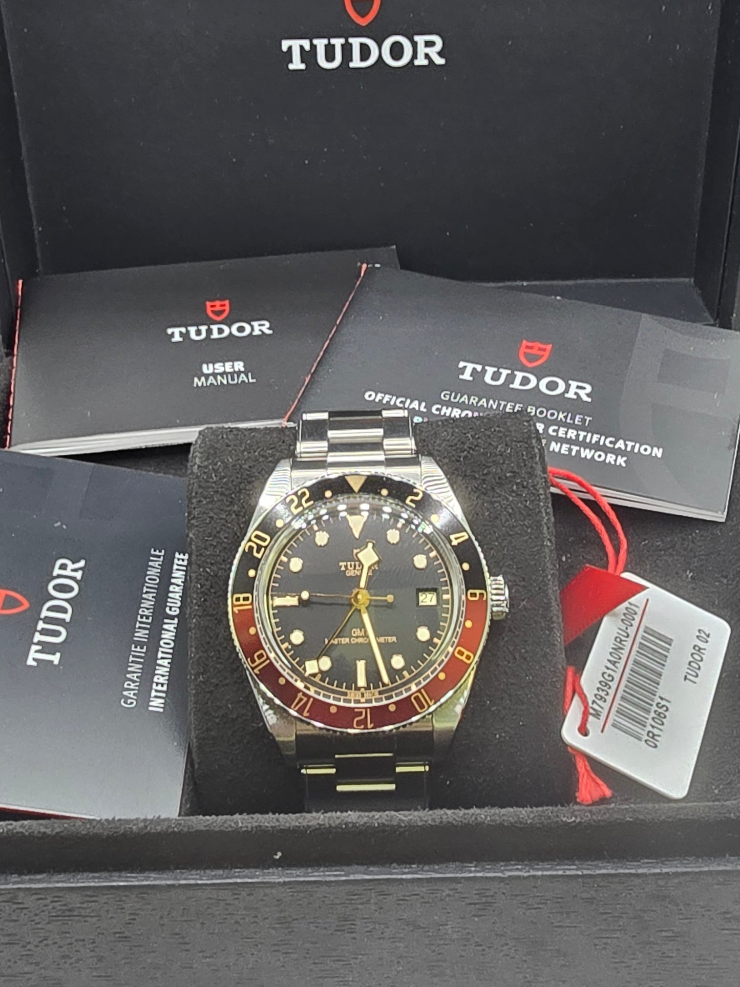 Tudor Black Bay 58 GMT Coke full set watch with black and red bezel, stainless steel bracelet, and year 2024 model.
