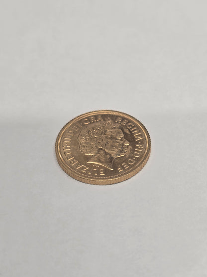 2012 Reeves and Sons full sovereign coin showing detailed design and inscriptions on the front side.