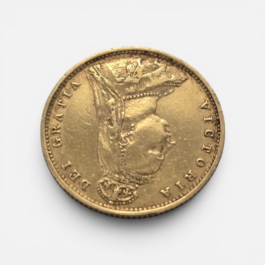 Gold coin featuring Queen Victoria, 1890 Half Sovereign, Reeves and Sons gold coin with detailed portrait and intricate design.