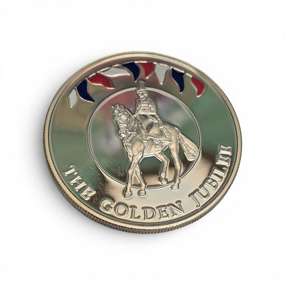 Silver 50 pence Golden Jubilee coin from 2002 by Reeves and Sons, showing detailed coin design and commemorative markings.