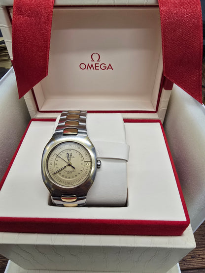 Vintage Omega Seamaster Polaris Chronograph watch with steel and gold bracelet, 1980s quartz model displaying a classic dial.
