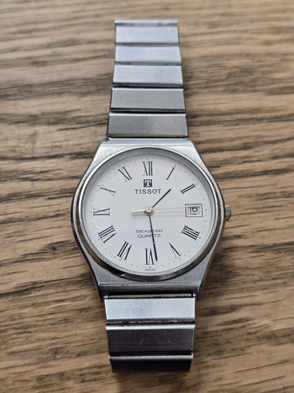 Vintage Tissot Seastar Quartz Stainless Steel White Dial Roman Numeral Date Watch