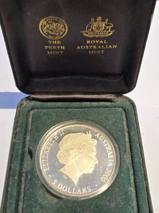 Australia 2000 Sydney Olympics Platypus silver proof coin by Reeves and Sons, featuring detailed platypus design on the coin surface.
