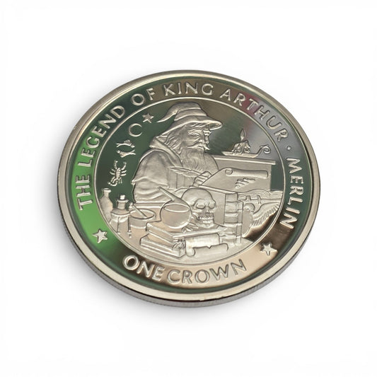 Silver King Arthur coin featuring a crown design from Reeves and Sons, showcasing detailed engravings and historical imagery.