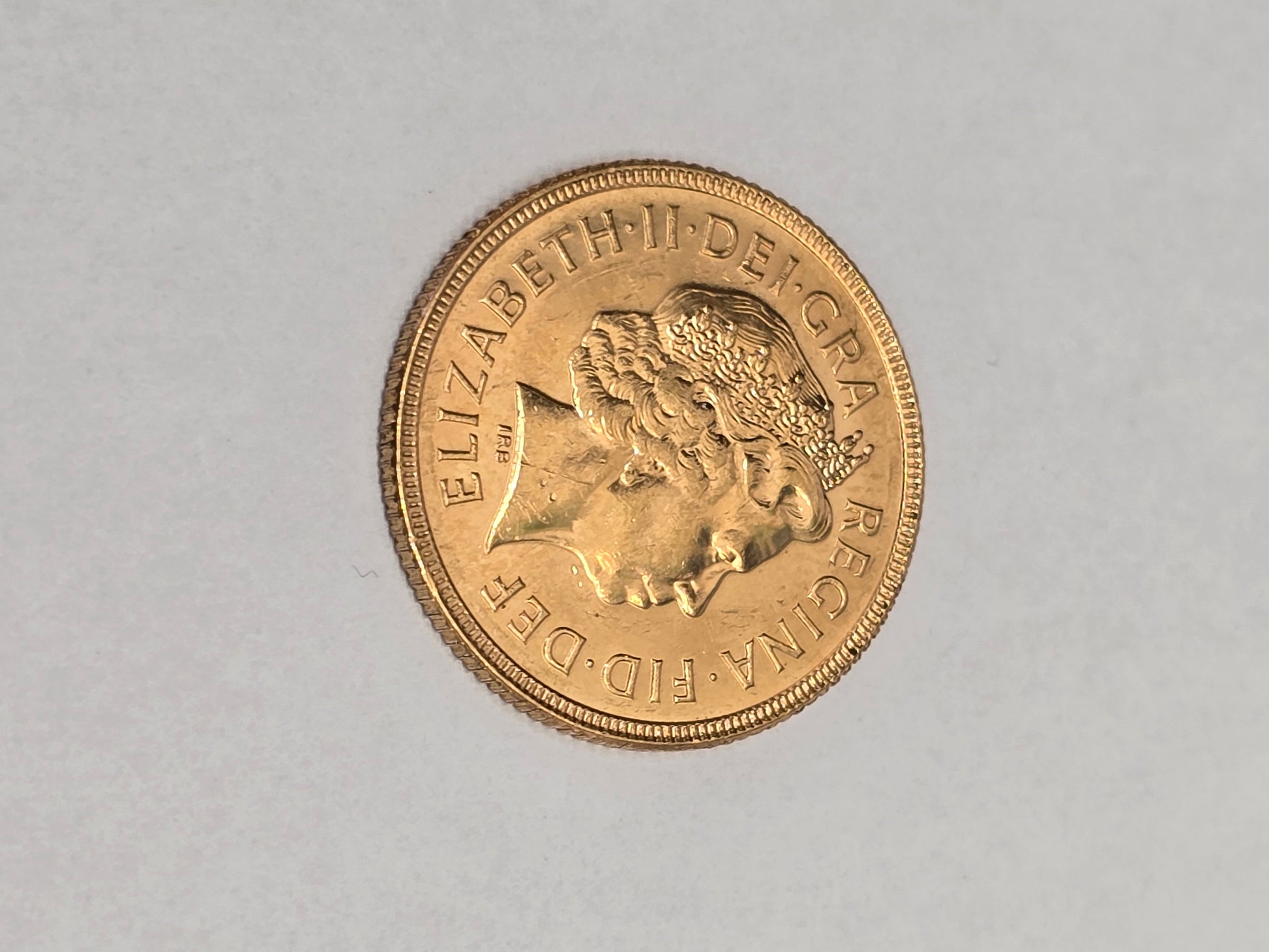2001 Reeves and Sons full sovereign coin showing detailed portrait and inscriptions on the front side.