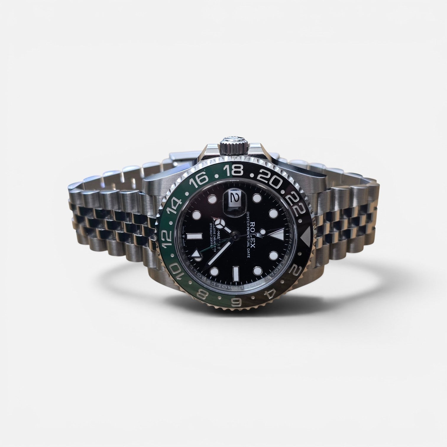 Rolex GMT Master II 126720VTTNR watch with green and black bezel, full set, featuring a stainless steel bracelet and detailed dial.
