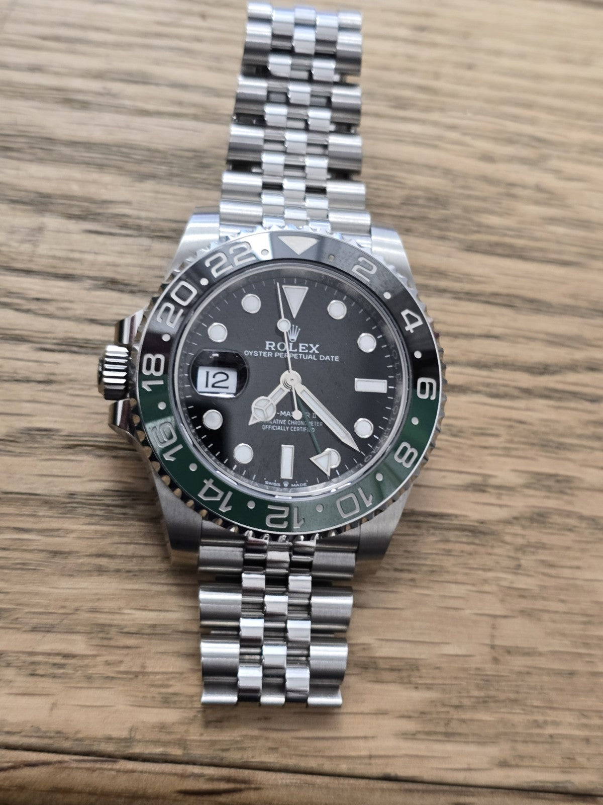 Rolex GMT Master II 126720VTRN watch with green and black bezel, stainless steel bracelet, full set, model from 2025.