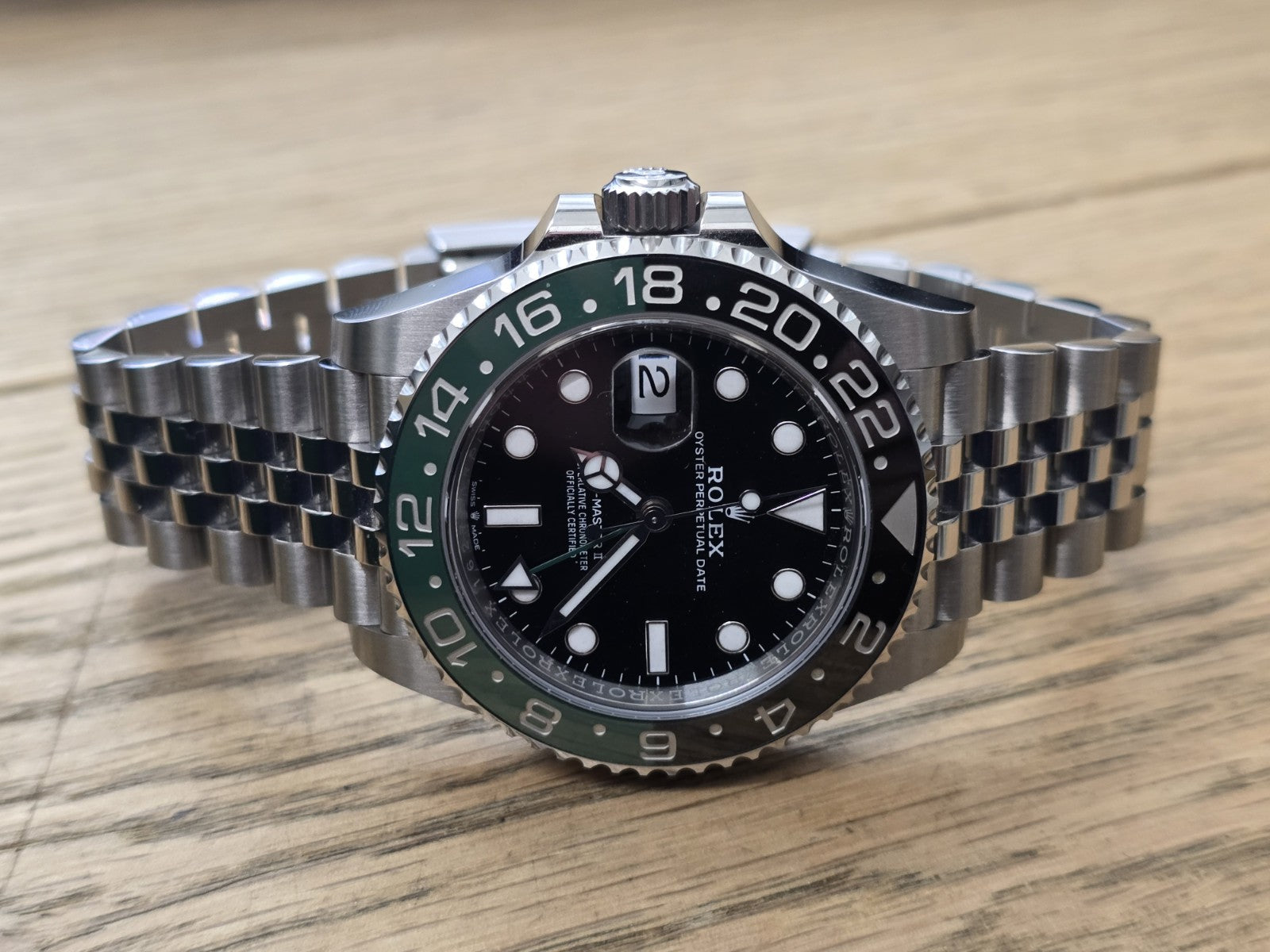 Rolex GMT Master II 126720VTR Nike Sprite watch with stainless steel bracelet and black dial, full set with box and papers.