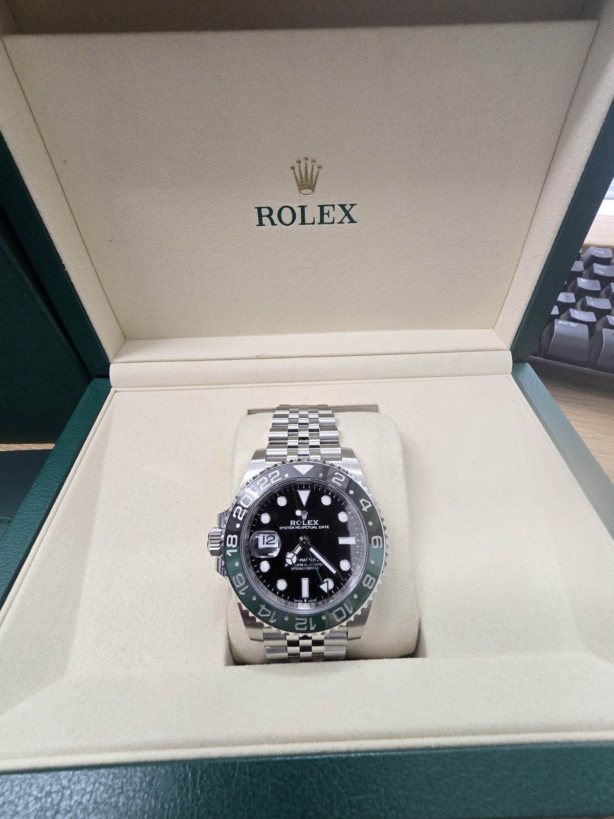 Rolex GMT Master II 126720VTNR watch with green and black bezel, stainless steel bracelet, full set including box and papers