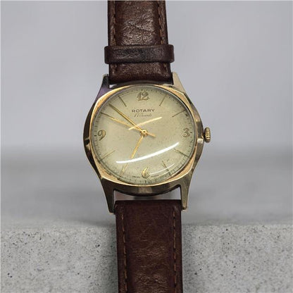 9ct yellow gold Rotary watch with a classic round face and elegant design, showcasing the luxurious timepiece.
