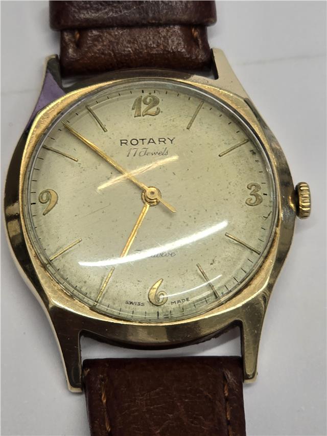 9ct yellow gold Rotary watch with a classic round dial and elegant design, showcasing the luxurious timepiece.