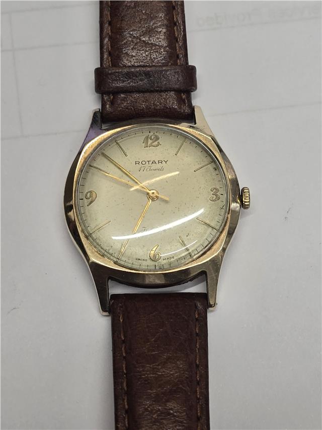 9ct yellow gold Rotary watch with a classic round face and elegant design, showcasing the luxurious timepiece.