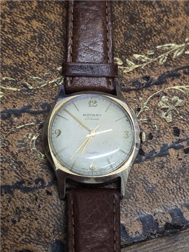 9ct yellow gold Rotary watch featuring a classic round dial and elegant design, displayed on a white background.