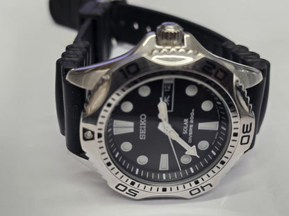 Seiko Solar Air Divers 200m watch with black dial, stainless steel band, and rotating bezel for diving and sports use