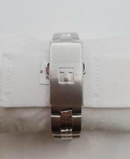 Tissot PR100 watch with box and papers, showcasing the classic stainless steel design and elegant face.