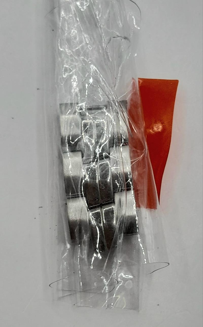 Tissot PR100 watch with box and papers, featuring a stainless steel bracelet and classic dial design.