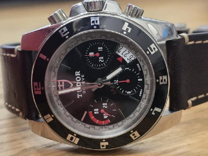 Tudor 20350N watch full set with box and papers, vintage 2011 model, featuring stainless steel bracelet and black dial.