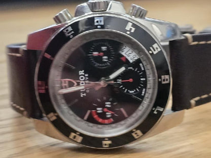 Tudor 20350N watch full set from 2011, featuring stainless steel case, black dial, and included accessories.