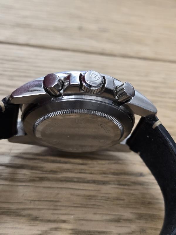 Tudor 20350N watch full set with strap, box, and papers, vintage 2011 model, featuring a black dial and stainless steel case.