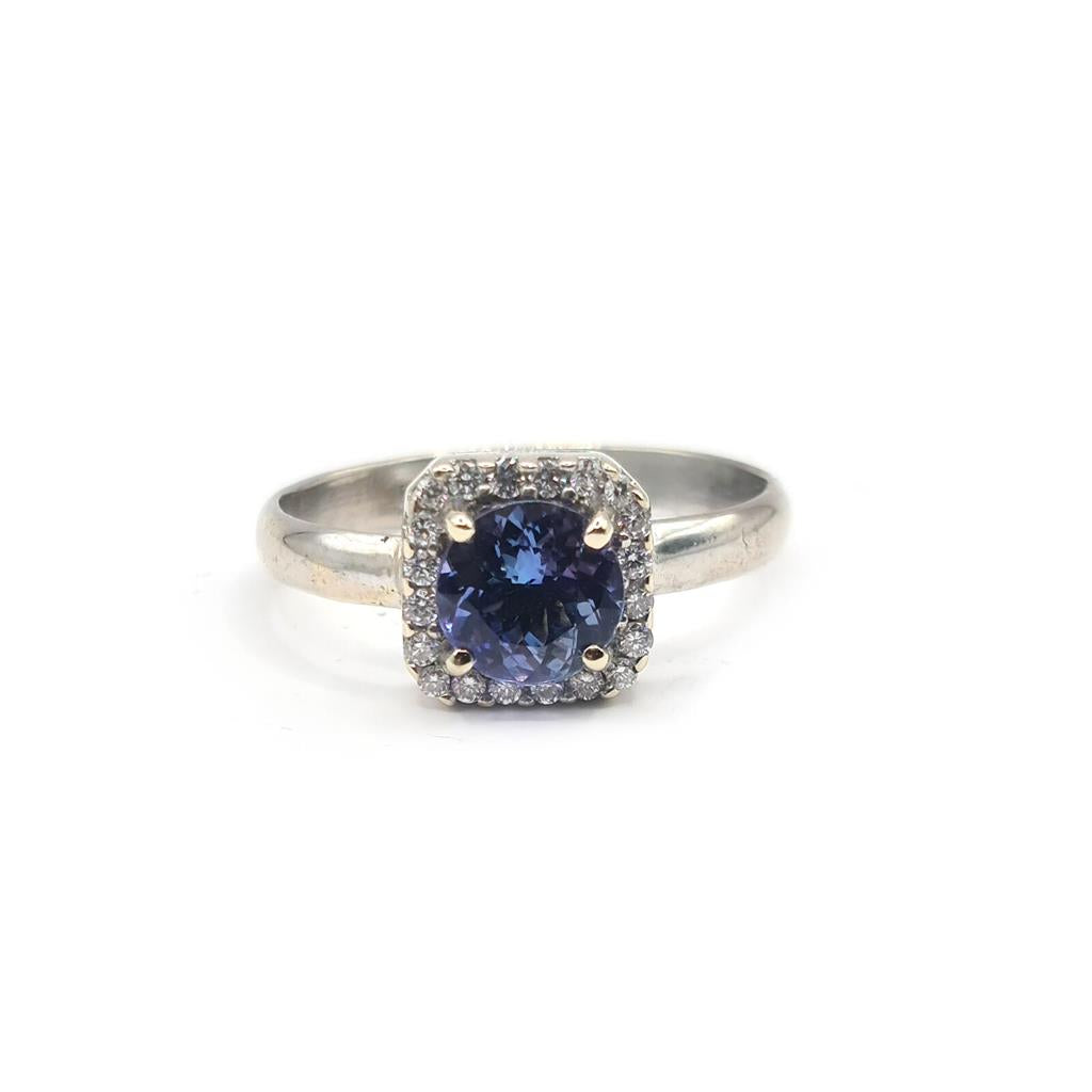 14ct diamond halo style ring with 1.10 carats of sparkling diamonds, featuring a sleek band and intricate halo setting.