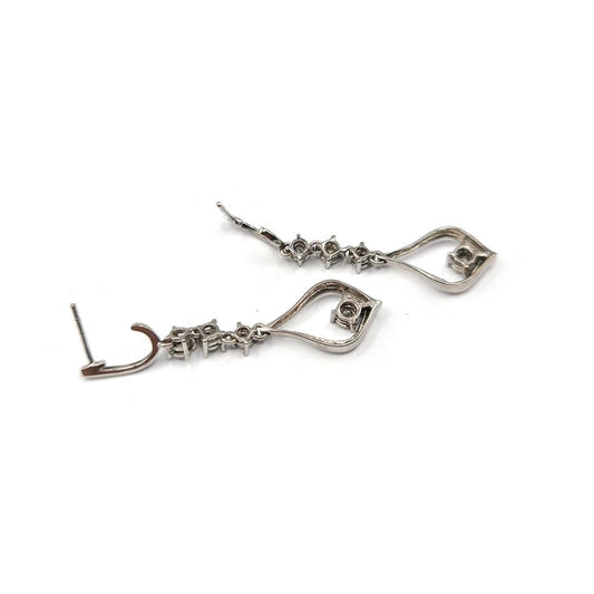 14ct white gold diamond drop earrings featuring 0.21 carats of sparkling diamonds, elegant jewelry for special occasions.