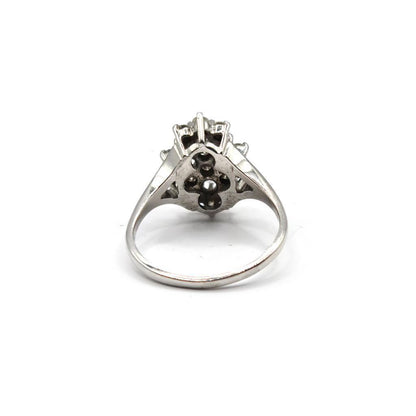 14ct white gold diamond cluster ring featuring a 1.12 carat sparkling diamond design on a sleek band.