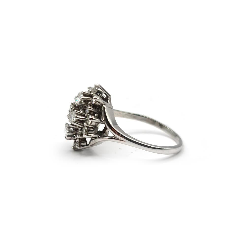 14k white gold diamond cluster ring featuring 1.12 carats of sparkling diamonds, elegant jewelry piece with intricate design.