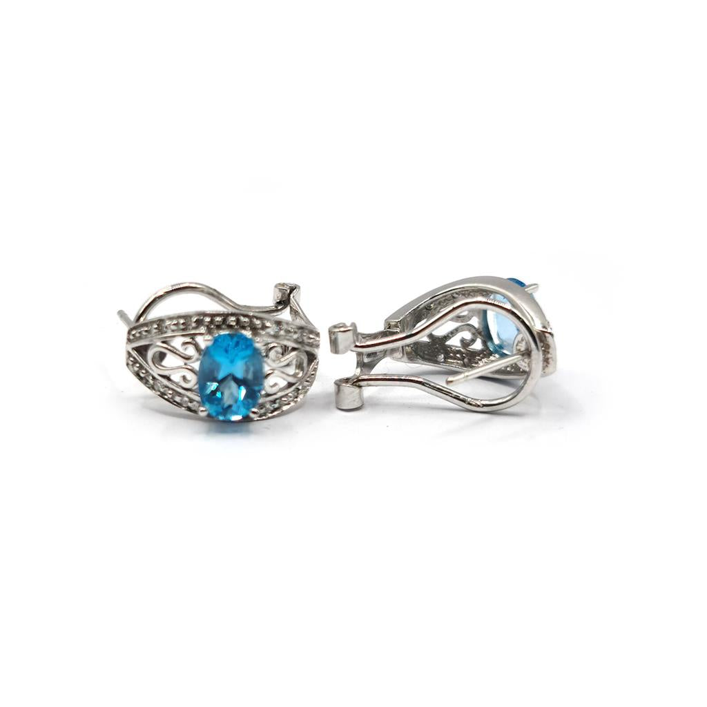 14ct white gold topaz and diamond earrings with post and lever back, featuring 1.70 carats of gemstones and elegant design.