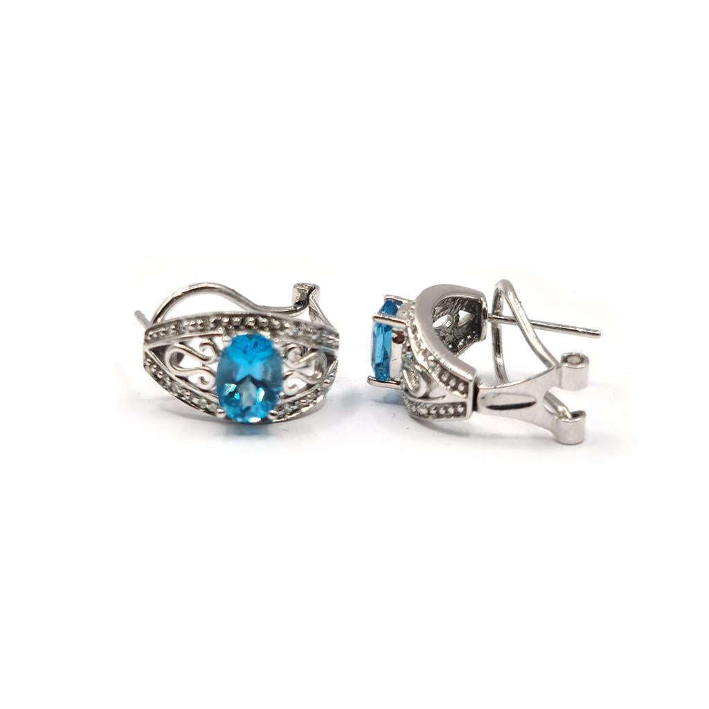 14ct white gold earrings with 1.70 carat topaz and diamonds, featuring post and lever back for secure wear.